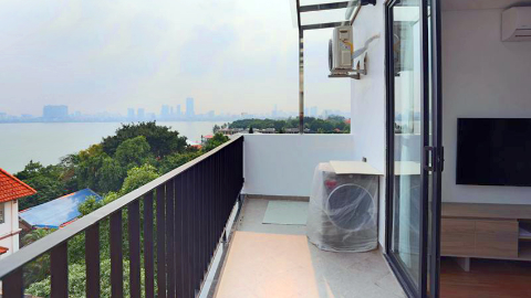 Tranquil 1-Bedroom Top Floor Apartment for Rent in Quiet Alley on Xuan Dieu Street with Lake View