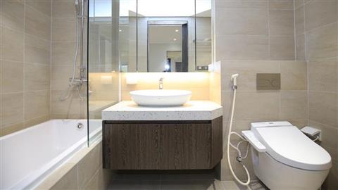 Master bathroom with bathtub